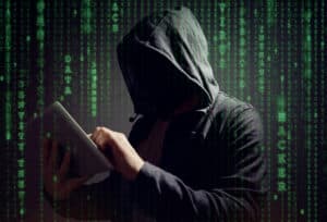 computer hacker threatening online safety