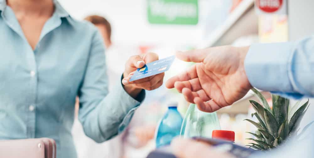 Woman using a credit card